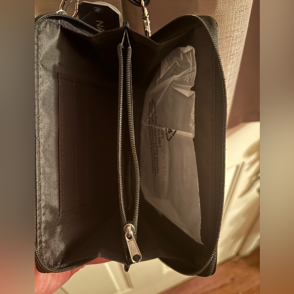 Nautica black wallet and cell phone case with adjustable strap. - Picture 5 of 7